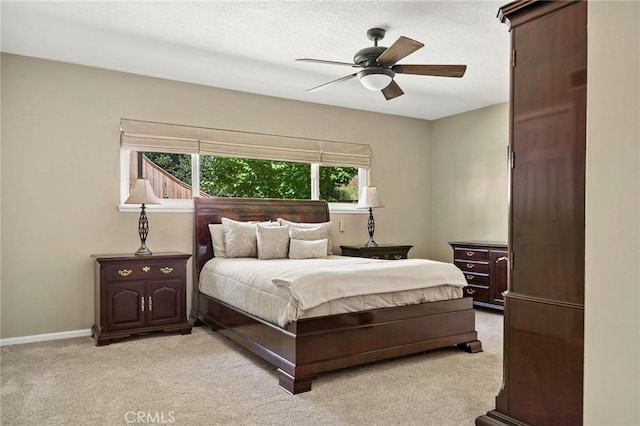 1330 S Center St, Redlands, CA 92373 - bedroom featuring light carpet, ceiling fan, and baseboards