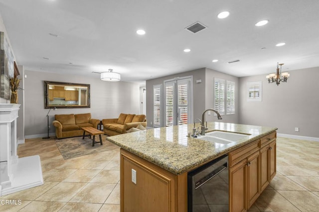 1315 Donegal Way, Oxnard, CA 93035 - kitchen with dishwashing machine, recessed lighting, brown cabinetry, light tile patterned flooring, and light stone counters