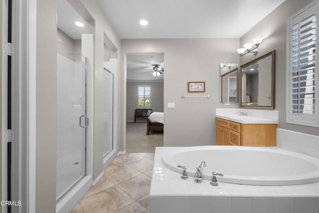 1315 Donegal Way, Oxnard, CA 93035 - ensuite bathroom with a bath, a shower stall, vanity, ceiling fan, and tile patterned flooring