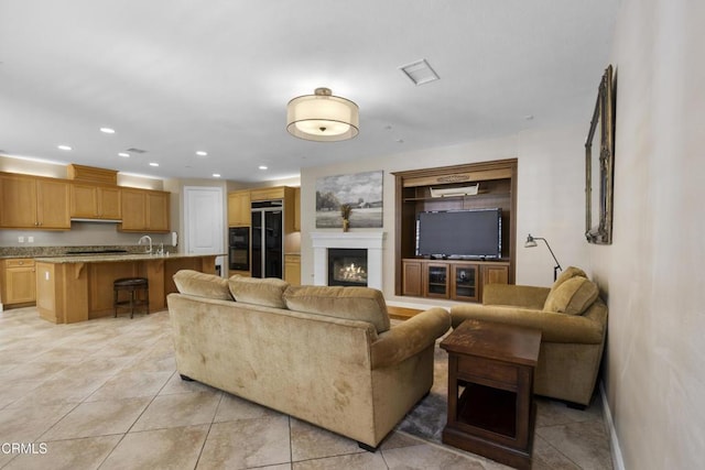 1315 Donegal Way, Oxnard, CA 93035 - living room featuring a fireplace, recessed lighting, and light tile patterned floors