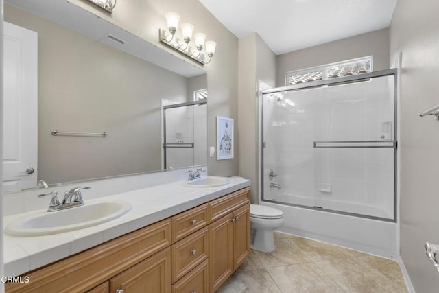 1315 Donegal Way, Oxnard, CA 93035 - full bath with double vanity, enclosed tub / shower combo, and tile patterned flooring