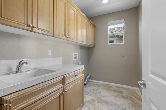 1315 Donegal Way, Oxnard, CA 93035 - washroom with cabinet space and hookup for a washing machine