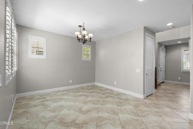 1315 Donegal Way, Oxnard, CA 93035 - unfurnished room featuring healthy amount of natural light, a chandelier, recessed lighting, and light tile patterned floors
