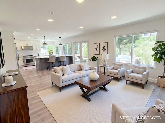 26871 Recodo Ln, Mission Viejo, CA 92691 - living room with light wood-style flooring, recessed lighting, and baseboards