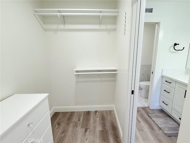 26871 Recodo Ln, Mission Viejo, CA 92691 - walk in closet featuring light wood-type flooring