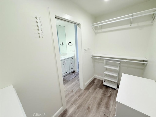 26871 Recodo Ln, Mission Viejo, CA 92691 - spacious closet featuring light wood finished floors