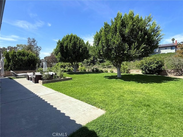 26871 Recodo Ln, Mission Viejo, CA 92691 - view of grassy yard featuring a patio area