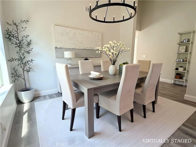 26871 Recodo Ln, Mission Viejo, CA 92691 - dining room featuring baseboards, wood finished floors, and a chandelier