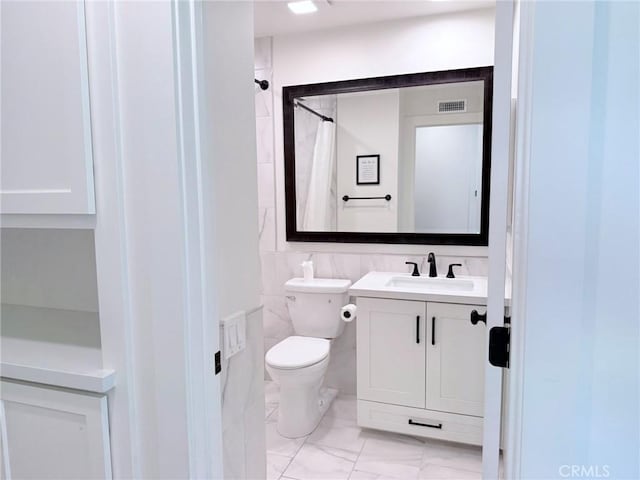 26871 Recodo Ln, Mission Viejo, CA 92691 - full bathroom with toilet, vanity, marble finish floors, and a shower with curtain