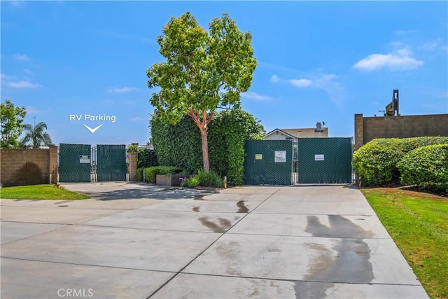 1132 Santiago Dr Unit 11, Placentia, CA 92870 - view of front of home with a gate and driveway