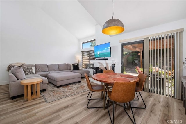 1132 Santiago Dr Unit 11, Placentia, CA 92870 - dining space featuring high vaulted ceiling and light wood-style flooring