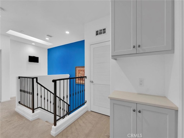 12347 N Aragon Way, Sylmar, CA 91342 - corridor with an upstairs landing, light carpet, recessed lighting, and baseboards