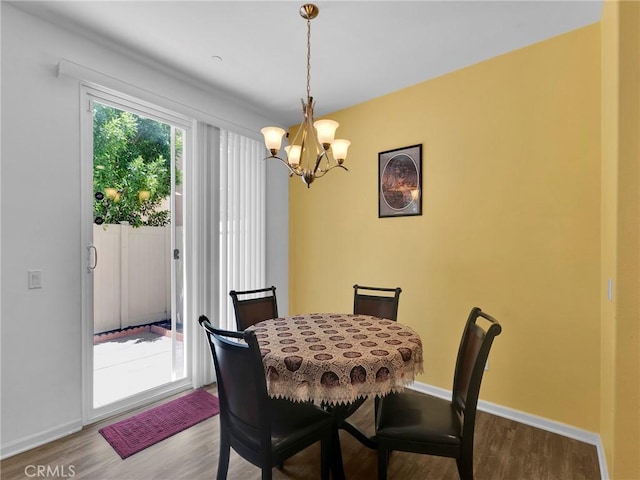 12347 N Aragon Way, Sylmar, CA 91342 - dining area with wood finished floors, a chandelier, and baseboards