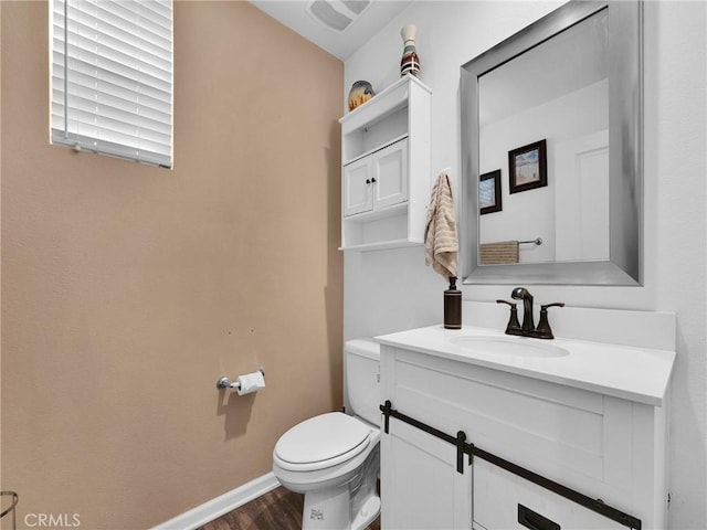 12347 N Aragon Way, Sylmar, CA 91342 - bathroom featuring toilet, vanity, wood finished floors, and baseboards