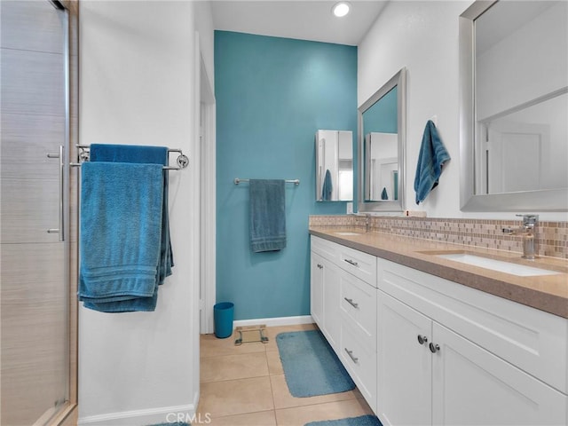 12347 N Aragon Way, Sylmar, CA 91342 - bathroom with double vanity, tile patterned floors, baseboards, a stall shower, and recessed lighting