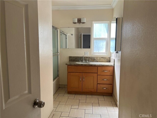 657 S Sadler Ave, East Los Angeles, CA 90022 - full bathroom featuring ornamental molding and vanity