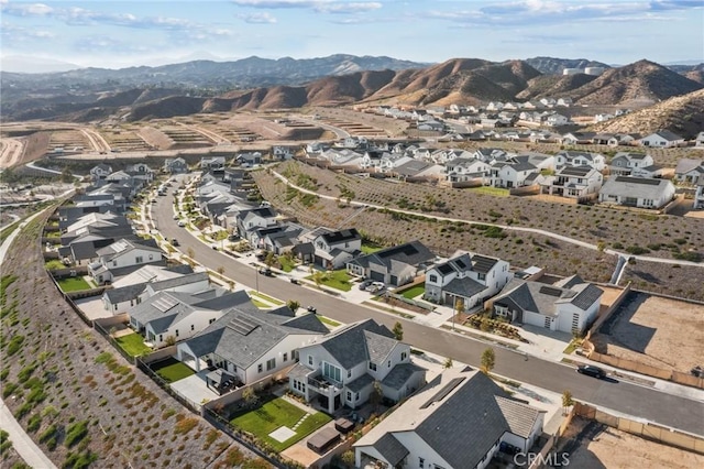 28709 Wildflower, Castaic, CA 91384 - aerial overview of property's location with a mountain backdrop and nearby suburban area