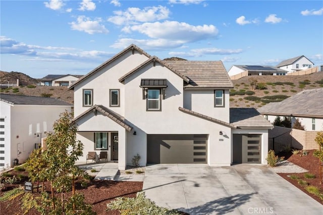 28709 Wildflower, Castaic, CA 91384 - view of front of home with a garage, stucco siding, concrete driveway, and a tile roof