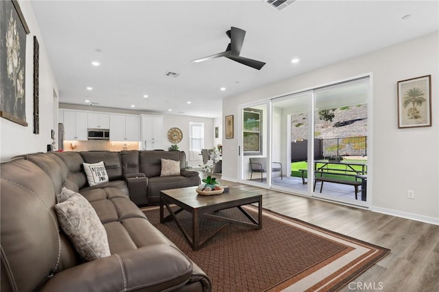 28709 Wildflower, Castaic, CA 91384 - living room with ceiling fan, light wood-style floors, baseboards, and recessed lighting