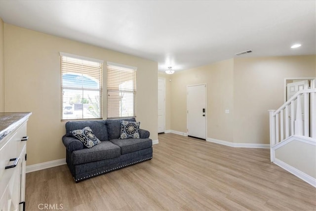 19454 Copper Ridge St, Perris, CA 92570 - living area with light wood finished floors and baseboards