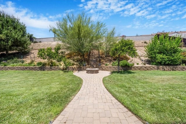 19454 Copper Ridge St, Perris, CA 92570 - view of grassy yard featuring a fire pit