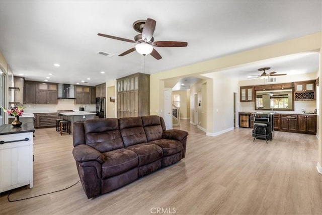 19454 Copper Ridge St, Perris, CA 92570 - living area with ceiling fan, light wood-style floors, and recessed lighting