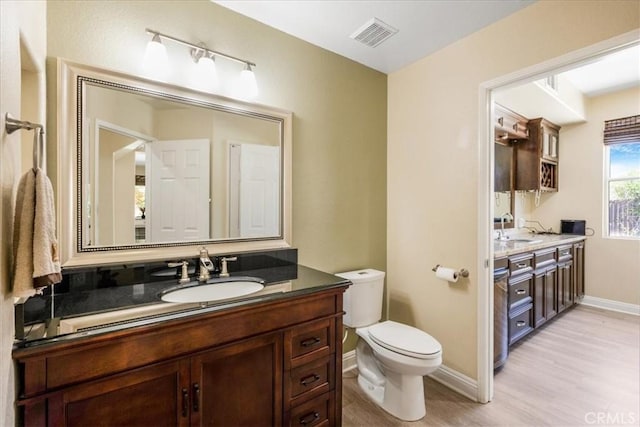 19454 Copper Ridge St, Perris, CA 92570 - bathroom with wood finished floors and vanity