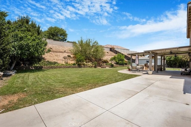 19454 Copper Ridge St, Perris, CA 92570 - view of grassy yard with a patio and ceiling fan