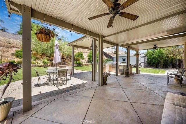 19454 Copper Ridge St, Perris, CA 92570 - view of patio featuring outdoor dining area, a storage shed, and ceiling fan