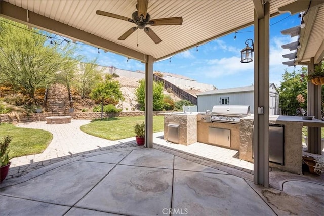 19454 Copper Ridge St, Perris, CA 92570 - view of patio / terrace featuring an outdoor kitchen, an outdoor fire pit, and a ceiling fan