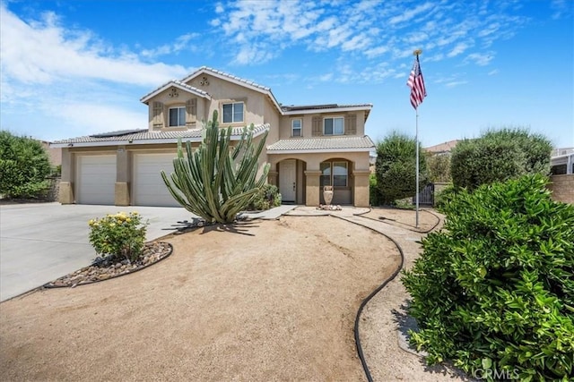 19454 Copper Ridge St, Perris, CA 92570 - mediterranean / spanish home featuring stucco siding, solar panels, concrete driveway, and a tiled roof
