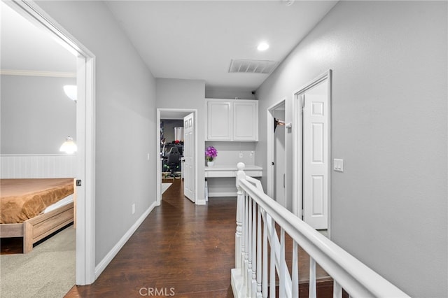 13279 Coffeetree St, Moreno Valley, CA 92553 - hall featuring dark wood finished floors, an upstairs landing, and baseboards