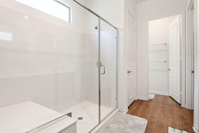 24190 Evesong Dr, Corona, CA 92883 - bathroom featuring a shower stall and wood finished floors