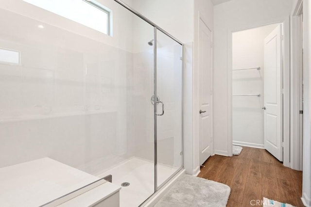 24190 Evesong Dr, Corona, CA 92883 - bathroom with a shower stall and wood finished floors