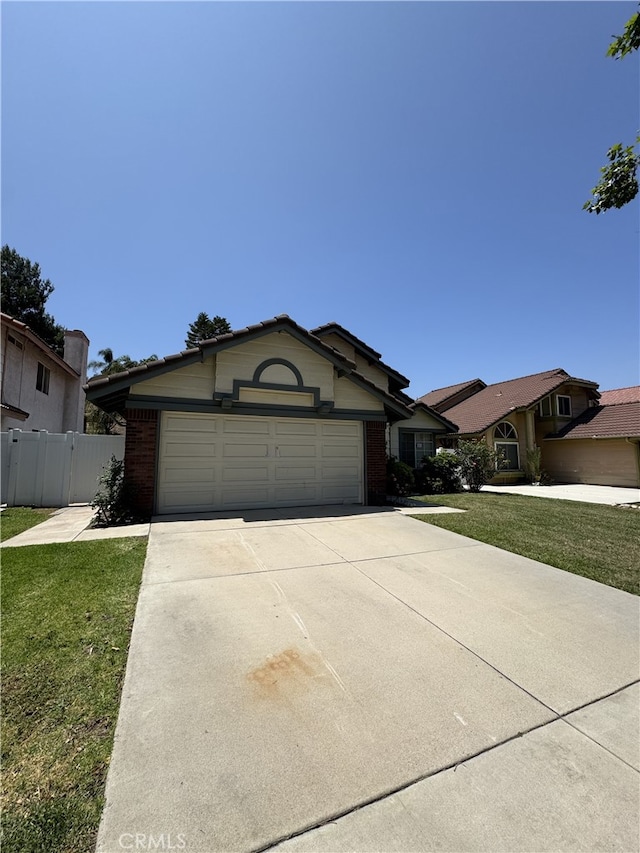 3178 Dogwood Dr, Corona, CA 92882 - single story home featuring a garage, concrete driveway, and brick siding