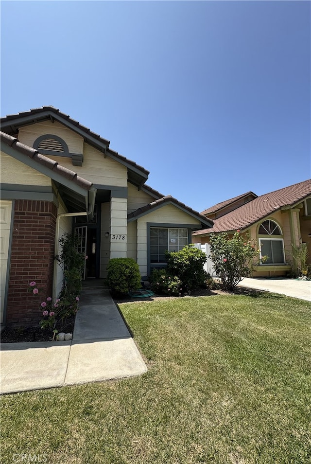 3178 Dogwood Dr, Corona, CA 92882 - view of front of property with a front yard and brick siding