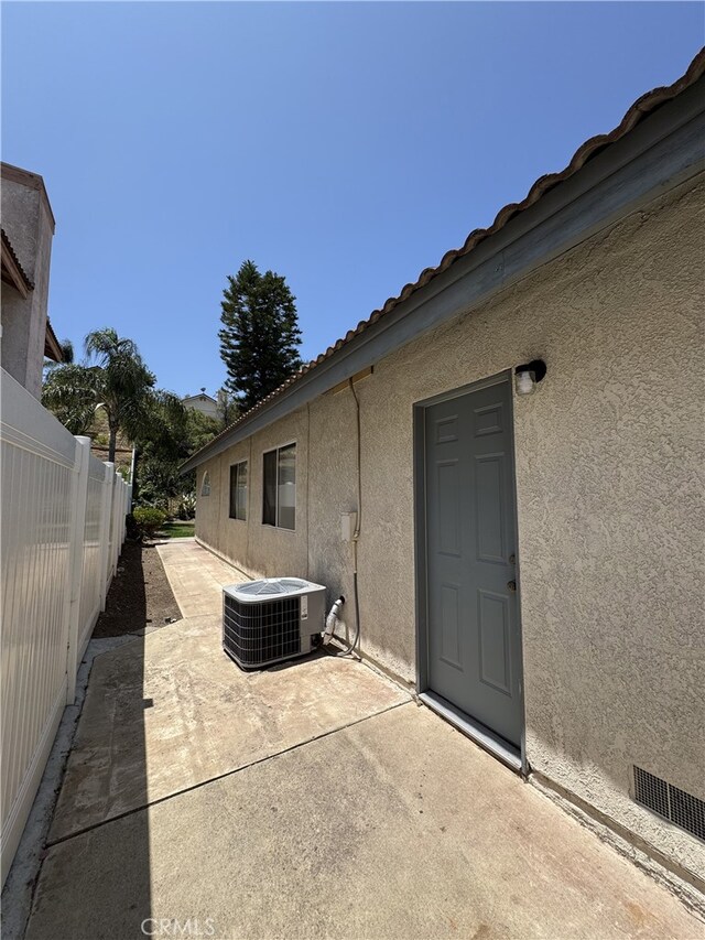 3178 Dogwood Dr, Corona, CA 92882 - view of patio with central AC unit