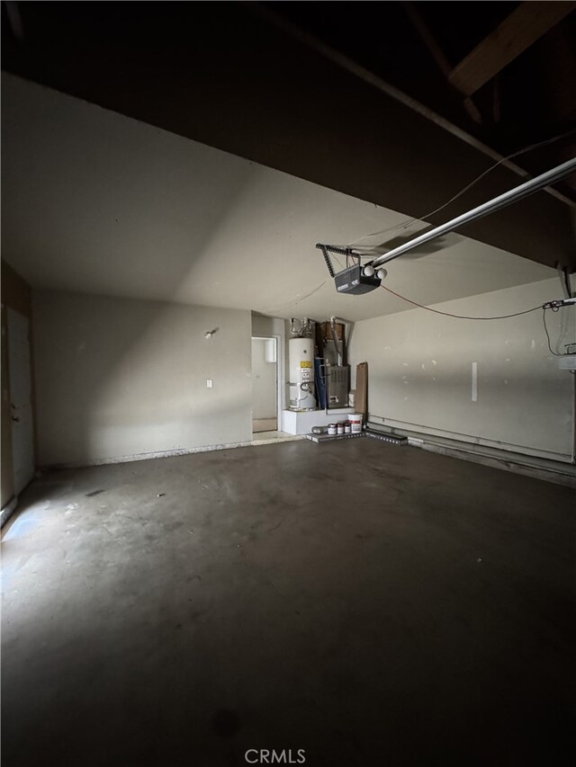 3178 Dogwood Dr, Corona, CA 92882 - garage with a garage door opener and water heater