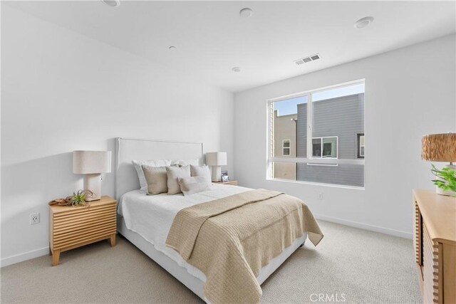 94231/2 N Sepulveda Blvd Unit 4, North Hills, CA 91343 - bedroom with light carpet and baseboards