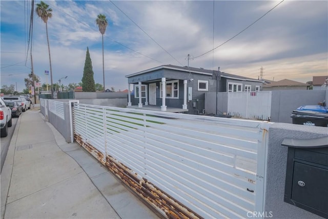 5837 Esperanza Ave, Whittier, CA 90606 - view of front facade with a fenced front yard and covered porch