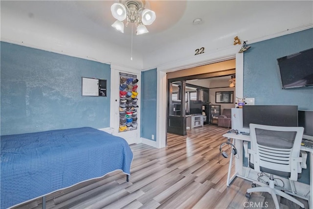 5837 Esperanza Ave, Whittier, CA 90606 - bedroom with a desk, wood finished floors, and ceiling fan