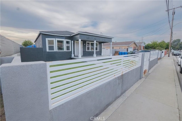 5837 Esperanza Ave, Whittier, CA 90606 - view of front of home featuring a fenced front yard and a porch