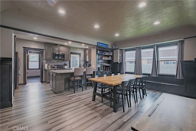 5837 Esperanza Ave, Whittier, CA 90606 - dining space with a textured ceiling, light wood-style flooring, and recessed lighting