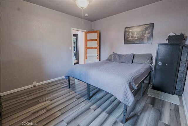 5837 Esperanza Ave, Whittier, CA 90606 - bedroom with wood finished floors and baseboards