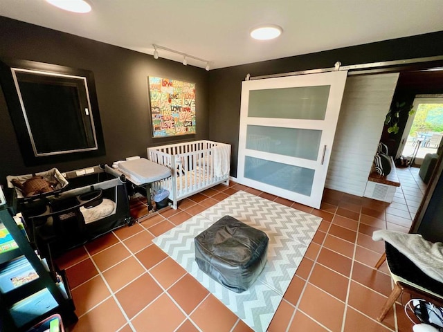 2073 Elevado Rd, Vista, CA 92084 - interior space with a barn door and rail lighting