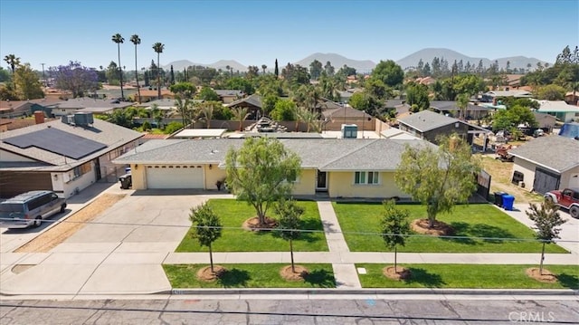 17623 Pine Ave, Fontana, CA 92335 - aerial perspective of suburban area featuring mountains