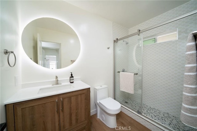 3037 Pacific Ave, Long Beach, CA 90806 - full bath featuring toilet, vanity, a shower stall, and wood finished floors