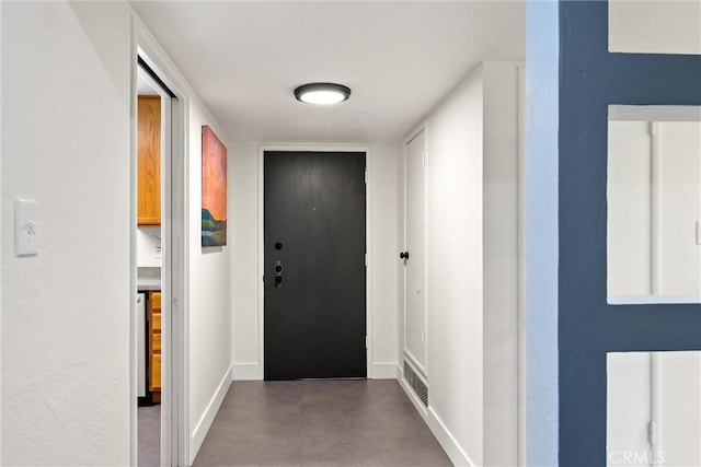 1516 Downing Ave, Chico, CA 95926 - entryway featuring baseboards and concrete flooring