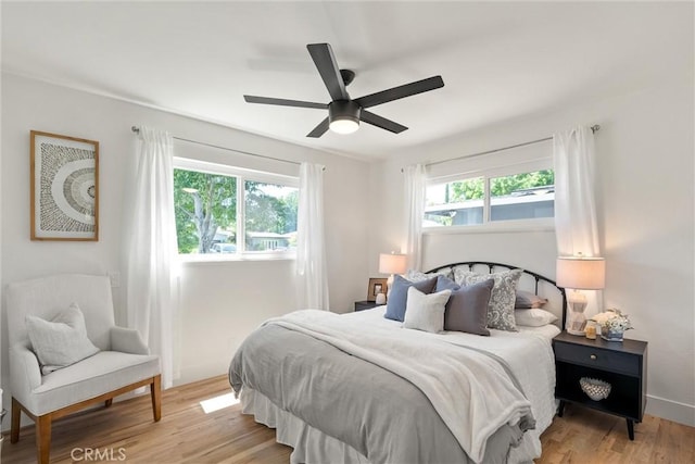 1516 Downing Ave, Chico, CA 95926 - bedroom with light wood-type flooring, ceiling fan, and baseboards