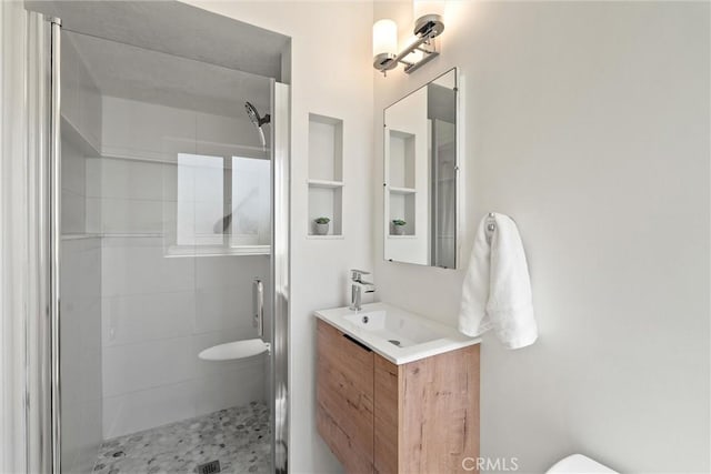 1516 Downing Ave, Chico, CA 95926 - bathroom featuring a shower stall, toilet, and vanity